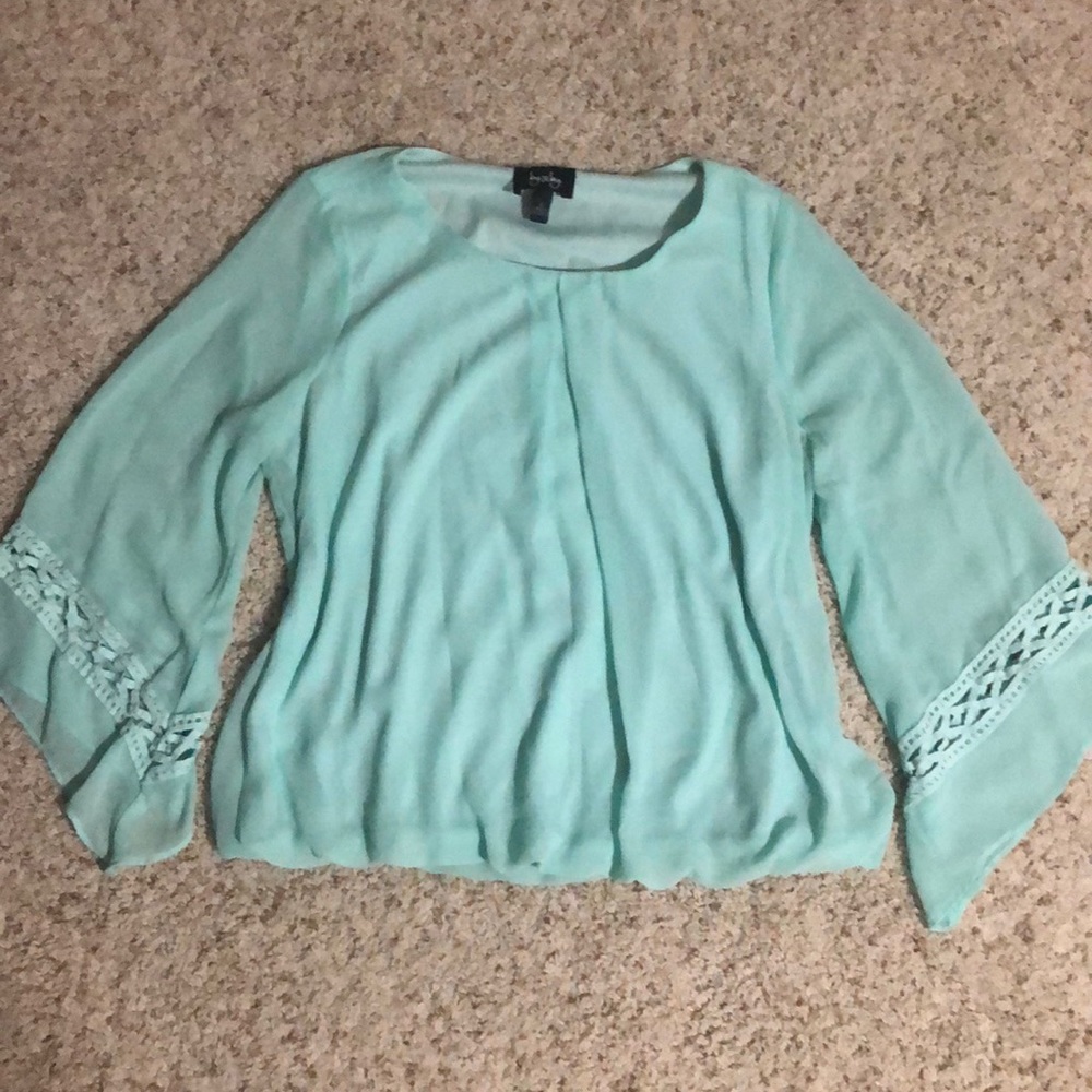 Cute turquoise blouse with flowy sleeves